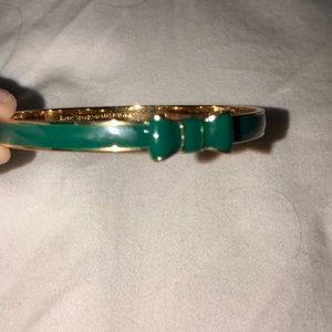 Kate Spade green bow bracelet.